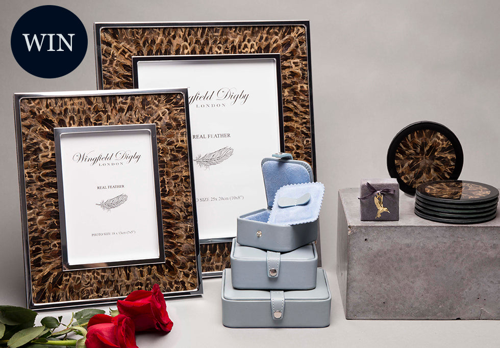 Competition prize: feather photo frames, coasters and grey leather jewellery boxes with red roses
