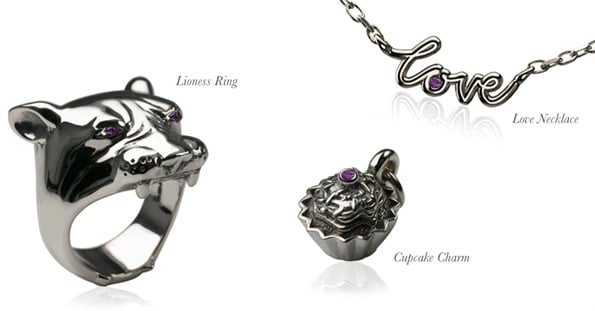 Silver Lioness ring, Love necklace and Cupcake charm, each set with purple amethysts, on a white background
