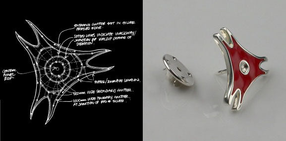 Design sketch and finished silver tie pin with red enamel, shaped like the Ferrari World Abu Dhabi roof