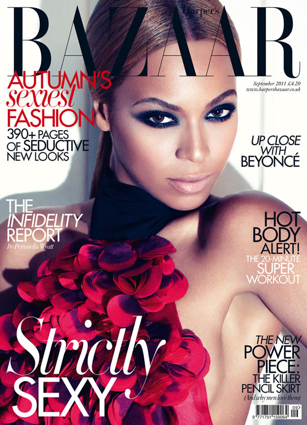 Harper's Bazaar September 2011 cover showing a woman in a red petal top against a pale background