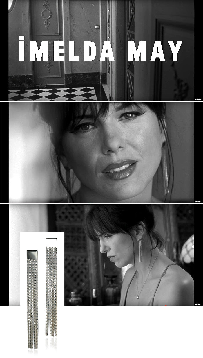 Imelda May in a black and white music video wearing long silver chain tassel earrings, shown alongside the pair