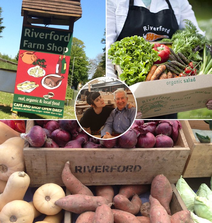 Riverford Farm Shop sign, a box of organic vegetables and crates of red onions, squash and sweet potatoes