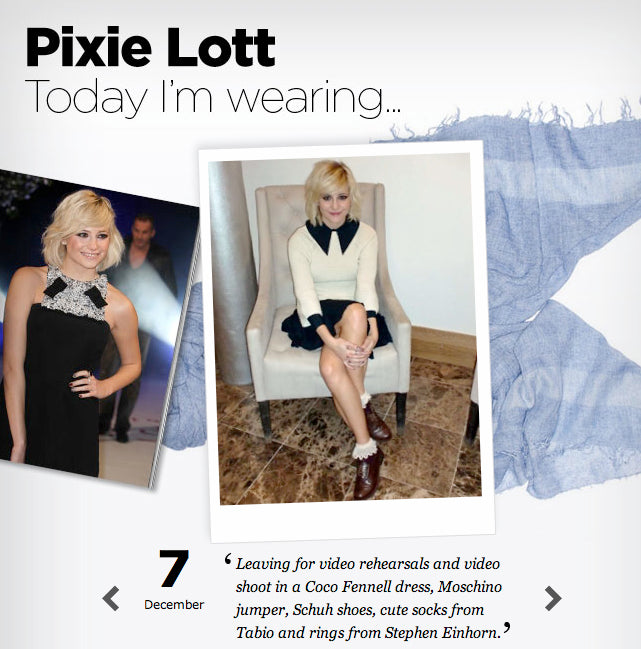 Vogue.co.uk Today I'm Wearing page showing Pixie Lott in a cream jumper and black skirt, wearing Stephen Einhorn rings