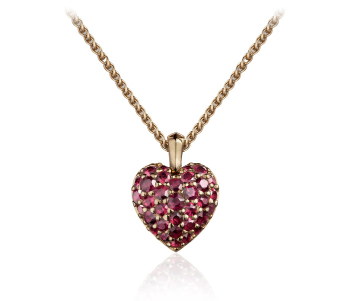 Heart pendant pavé set with rubies in rose gold on a fine gold chain