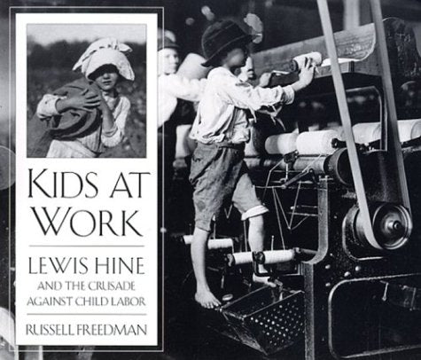 Cover of Kids at Work by Russell Freedman, a Lewis Hine photograph of a barefoot boy at a mill machine