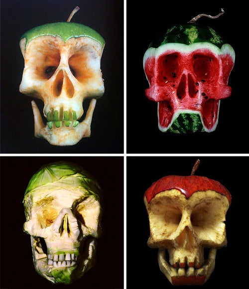 Four apples, a watermelon and a cabbage carved into human skulls, shown against black backgrounds