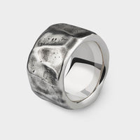a close up of a silver Beaten Extra Wide Ring
