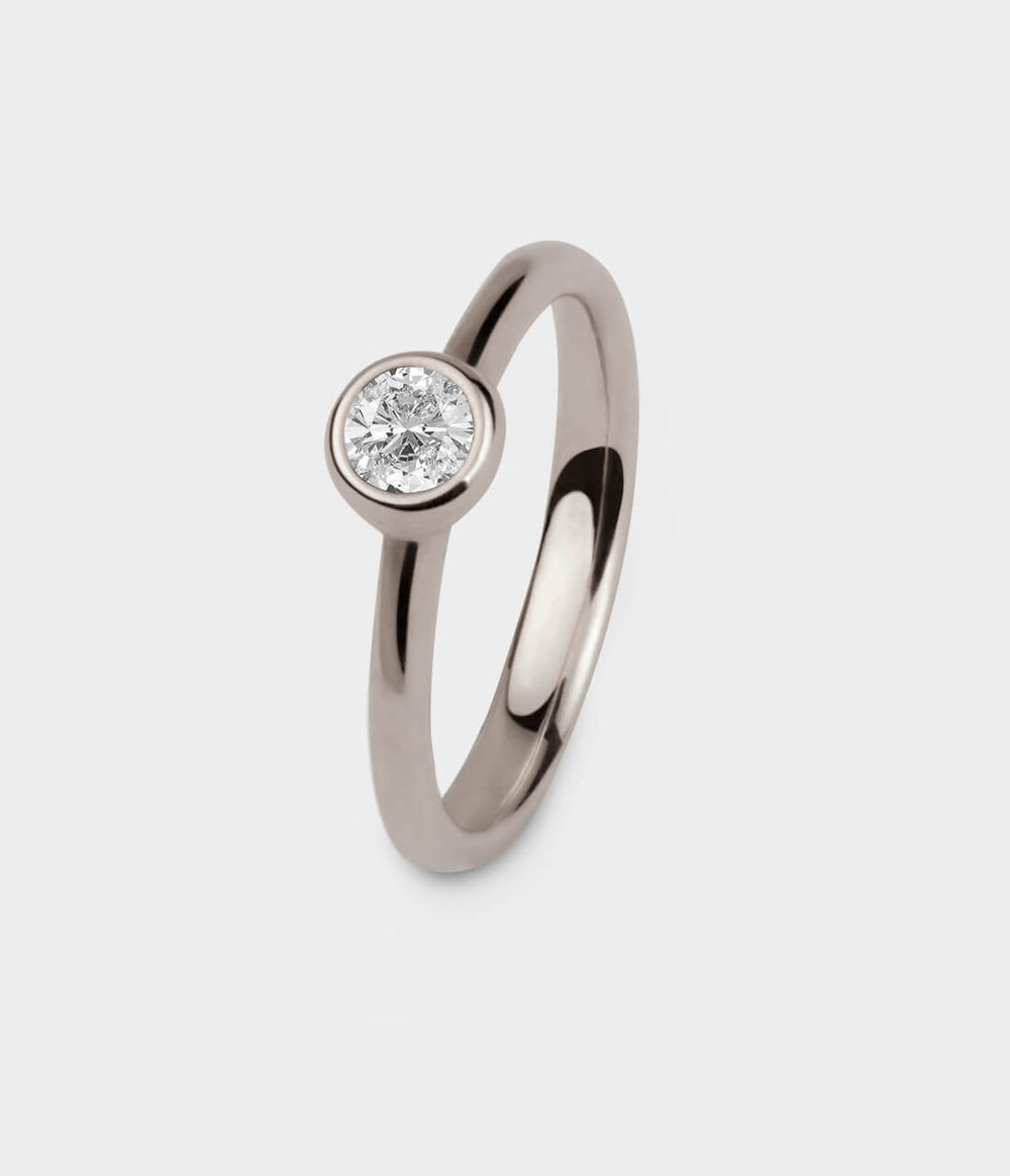 Halo 4 Ring in 18 Carat White Gold